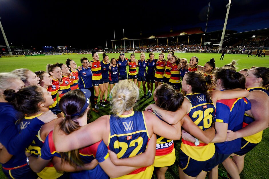 AFLW 2018 Rd 05 - Adelaide v Carlton ADELAIDE, AUSTRALIA - MARCH 03: Crows sing the team song at end the round five AFLW match between the Adelaide Crows and the Carlton Blues at Norwood Oval on March 3, 2018 in Adelaide, Australia. (Photo by Mark Brake/Getty Images/AFL Media)